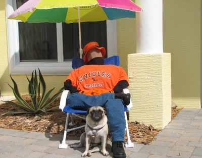 Henry sitting with the scarecrow